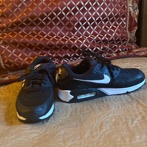 Black and white Nike shoes for women
